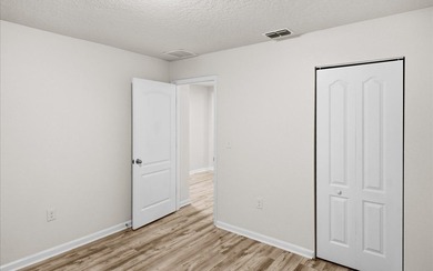 Located in the golf-cart-friendly Grand Reserve Golf Community on Grand Reserve Golf Course in Florida - for sale on GolfHomes.com, golf home, golf lot