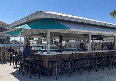 Price reduction on this fantastic location for a home base or on Deer Creek RV Golf Resort in Florida - for sale on GolfHomes.com, golf home, golf lot