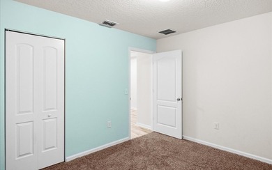 Located in the golf-cart-friendly Grand Reserve Golf Community on Grand Reserve Golf Course in Florida - for sale on GolfHomes.com, golf home, golf lot