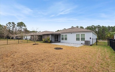 Located in the golf-cart-friendly Grand Reserve Golf Community on Grand Reserve Golf Course in Florida - for sale on GolfHomes.com, golf home, golf lot