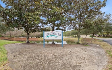 Located in the golf-cart-friendly Grand Reserve Golf Community on Grand Reserve Golf Course in Florida - for sale on GolfHomes.com, golf home, golf lot