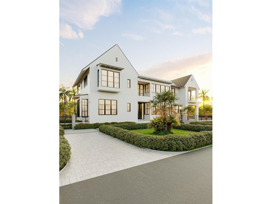 This is the one you've been waiting for, a brand new custom home on La Gorce Country Club in Florida - for sale on GolfHomes.com, golf home, golf lot
