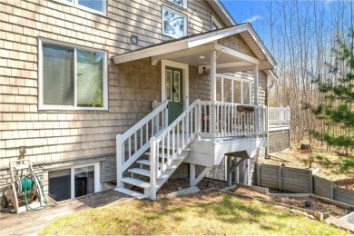 Experience the best of cabin comfort and modern design in this on Voyager Village Country Club - Voyager in Wisconsin - for sale on GolfHomes.com, golf home, golf lot