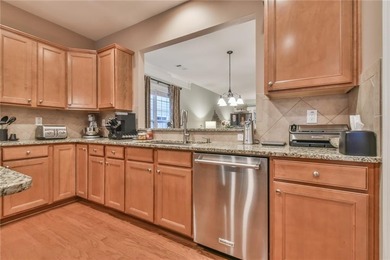 Come view this charming two-bedroom, two-bathroom home in the on Reunion Golf Club in Georgia - for sale on GolfHomes.com, golf home, golf lot