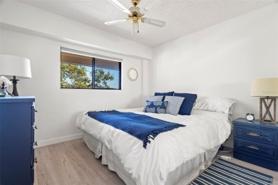 BEAUTIFUL END UNIT on the 2nd floor with stunning golf course on Tarpon Springs Golf Course in Florida - for sale on GolfHomes.com, golf home, golf lot