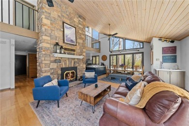 Experience the best of cabin comfort and modern design in this on Voyager Village Country Club - Voyager in Wisconsin - for sale on GolfHomes.com, golf home, golf lot