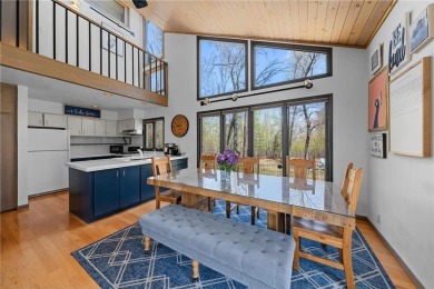 Experience the best of cabin comfort and modern design in this on Voyager Village Country Club - Voyager in Wisconsin - for sale on GolfHomes.com, golf home, golf lot