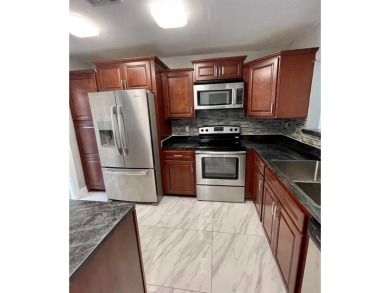 Beautiful 2 bedroom 2 bath Villa with 1 car garage and laundry on Colony West Country Club in Florida - for sale on GolfHomes.com, golf home, golf lot