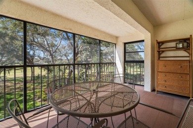 BEAUTIFUL END UNIT on the 2nd floor with stunning golf course on Tarpon Springs Golf Course in Florida - for sale on GolfHomes.com, golf home, golf lot