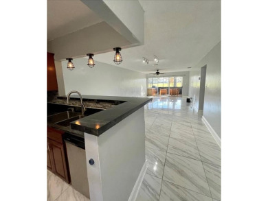 Beautiful 2 bedroom 2 bath Villa with 1 car garage and laundry on Colony West Country Club in Florida - for sale on GolfHomes.com, golf home, golf lot