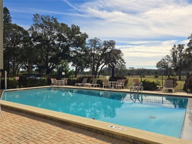 BEAUTIFUL END UNIT on the 2nd floor with stunning golf course on Tarpon Springs Golf Course in Florida - for sale on GolfHomes.com, golf home, golf lot