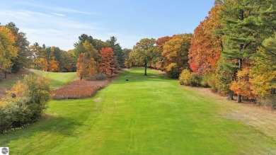 Located in the heart of Leland, this vacant parcel is one of a on Leland Country Club in Michigan - for sale on GolfHomes.com, golf home, golf lot