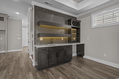 Experience exceptional coastal luxury in this magnificent on Myrtlewood Golf Course and Club  in South Carolina - for sale on GolfHomes.com, golf home, golf lot