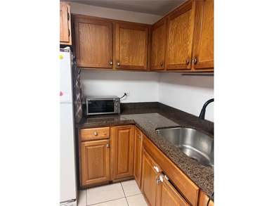 3-bedroom, 2-bathroom condo in the International Village. This on Inverrary Country Club in Florida - for sale on GolfHomes.com, golf home, golf lot