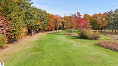 Located in the heart of Leland, this vacant parcel is one of a on Leland Country Club in Michigan - for sale on GolfHomes.com, golf home, golf lot