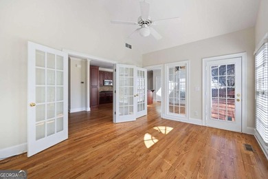 Tucked away on a quiet, double cul-de-sac street in Brookstone on Brookstone Golf and Country Club in Georgia - for sale on GolfHomes.com, golf home, golf lot