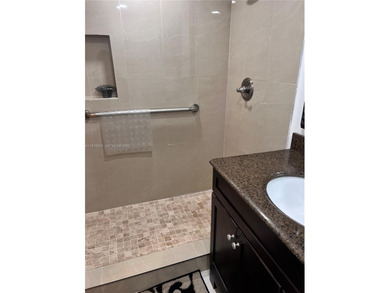 3-bedroom, 2-bathroom condo in the International Village. This on Inverrary Country Club in Florida - for sale on GolfHomes.com, golf home, golf lot