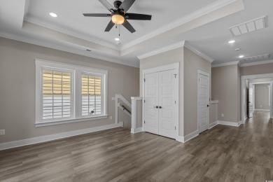 Experience exceptional coastal luxury in this magnificent on Myrtlewood Golf Course and Club  in South Carolina - for sale on GolfHomes.com, golf home, golf lot