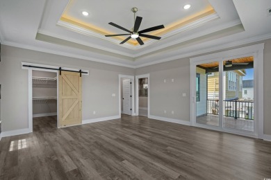 Experience exceptional coastal luxury in this magnificent on Myrtlewood Golf Course and Club  in South Carolina - for sale on GolfHomes.com, golf home, golf lot