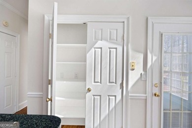 Tucked away on a quiet, double cul-de-sac street in Brookstone on Brookstone Golf and Country Club in Georgia - for sale on GolfHomes.com, golf home, golf lot