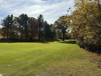 Located in the heart of Leland, this vacant parcel is one of a on Leland Country Club in Michigan - for sale on GolfHomes.com, golf home, golf lot