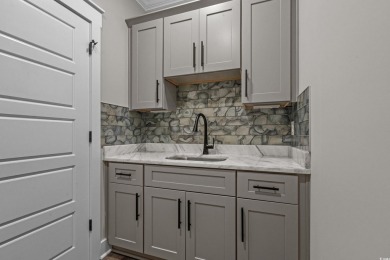 Experience exceptional coastal luxury in this magnificent on Myrtlewood Golf Course and Club  in South Carolina - for sale on GolfHomes.com, golf home, golf lot