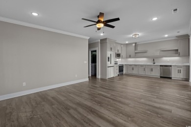 Experience exceptional coastal luxury in this magnificent on Myrtlewood Golf Course and Club  in South Carolina - for sale on GolfHomes.com, golf home, golf lot