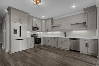 Experience exceptional coastal luxury in this magnificent on Myrtlewood Golf Course and Club  in South Carolina - for sale on GolfHomes.com, golf home, golf lot