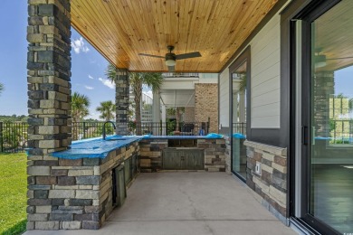 Experience exceptional coastal luxury in this magnificent on Myrtlewood Golf Course and Club  in South Carolina - for sale on GolfHomes.com, golf home, golf lot