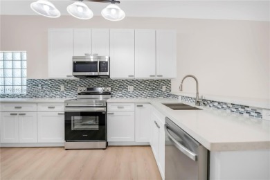 Beautifully updated LAKE FRONT 3-bed, 2-bath home in Grand on Grand Palms Hotel and Golf Resort in Florida - for sale on GolfHomes.com, golf home, golf lot