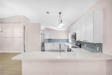Beautifully updated LAKE FRONT 3-bed, 2-bath home in Grand on Grand Palms Hotel and Golf Resort in Florida - for sale on GolfHomes.com, golf home, golf lot