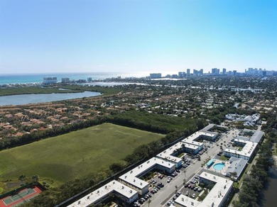 Sunny, Spectacular 55+ Condo w/Prime Location for the Ultimate on Eco Golf Club in Florida - for sale on GolfHomes.com, golf home, golf lot