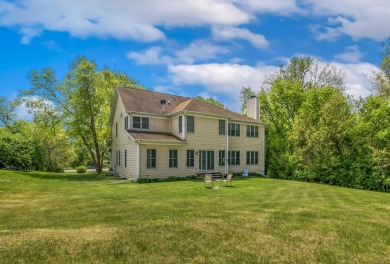 Tucked just outside of Country Club Estates, this home offers on Country Club Estates Golf Course in Wisconsin - for sale on GolfHomes.com, golf home, golf lot