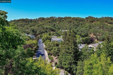 Spectacular views of the hills near and far, surrounded by on Rossmoor Golf Course in California - for sale on GolfHomes.com, golf home, golf lot