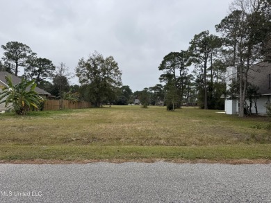 This beautiful lot is waiting on its permanent home build on Pass Christian Isles Golf Club in Mississippi - for sale on GolfHomes.com, golf home, golf lot