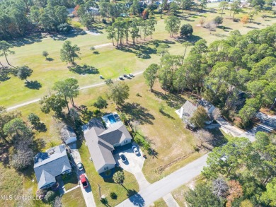 This beautiful lot is waiting on its permanent home build on Pass Christian Isles Golf Club in Mississippi - for sale on GolfHomes.com, golf home, golf lot