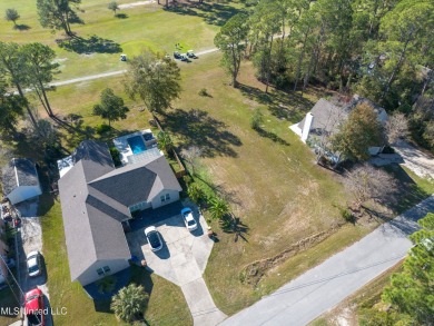 This beautiful lot is waiting on its permanent home build on Pass Christian Isles Golf Club in Mississippi - for sale on GolfHomes.com, golf home, golf lot