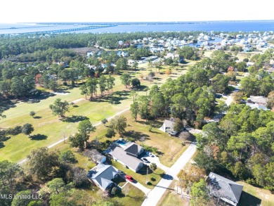 This beautiful lot is waiting on its permanent home build on Pass Christian Isles Golf Club in Mississippi - for sale on GolfHomes.com, golf home, golf lot