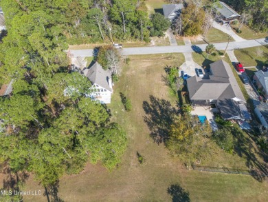 This beautiful lot is waiting on its permanent home build on Pass Christian Isles Golf Club in Mississippi - for sale on GolfHomes.com, golf home, golf lot