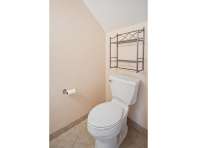 Don't miss this rare opportunity to own a light-filled on Palm Harbor Golf Club in Florida - for sale on GolfHomes.com, golf home, golf lot