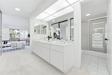 WOW. The door opens, and your attention is immediately drawn on Rancho San Joaquin Golf Course in California - for sale on GolfHomes.com, golf home, golf lot