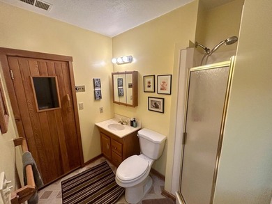 Very nice, well-kept 2 bedroom 2 bath home on the 7th hole of on Sugar Springs Country Club in Michigan - for sale on GolfHomes.com, golf home, golf lot