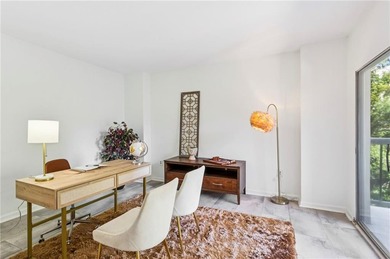 Experience city living at its best in this beautifully on Bobby Jones Golf Club in Georgia - for sale on GolfHomes.com, golf home, golf lot