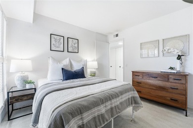 WOW. The door opens, and your attention is immediately drawn on Rancho San Joaquin Golf Course in California - for sale on GolfHomes.com, golf home, golf lot