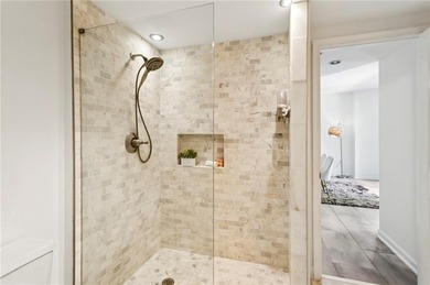 Experience city living at its best in this beautifully on Bobby Jones Golf Club in Georgia - for sale on GolfHomes.com, golf home, golf lot