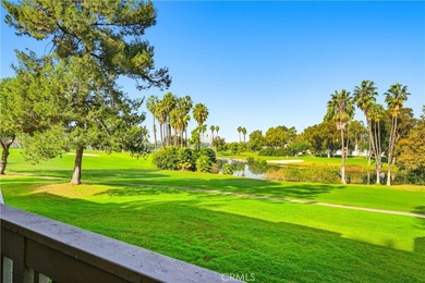 WOW. The door opens, and your attention is immediately drawn on Rancho San Joaquin Golf Course in California - for sale on GolfHomes.com, golf home, golf lot