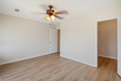 Don't miss this rare opportunity to own a light-filled on Palm Harbor Golf Club in Florida - for sale on GolfHomes.com, golf home, golf lot