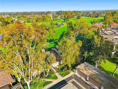 WOW. The door opens, and your attention is immediately drawn on Rancho San Joaquin Golf Course in California - for sale on GolfHomes.com, golf home, golf lot