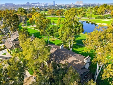 WOW. The door opens, and your attention is immediately drawn on Rancho San Joaquin Golf Course in California - for sale on GolfHomes.com, golf home, golf lot