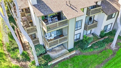 WOW. The door opens, and your attention is immediately drawn on Rancho San Joaquin Golf Course in California - for sale on GolfHomes.com, golf home, golf lot